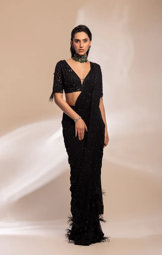 Black stitched saree with blouse and waistcoat, feather embellished